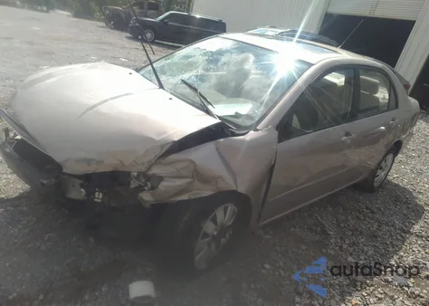 2003 Toyota Corolla Le from USA, damaged, VIN 1NXBR32E03Z019259